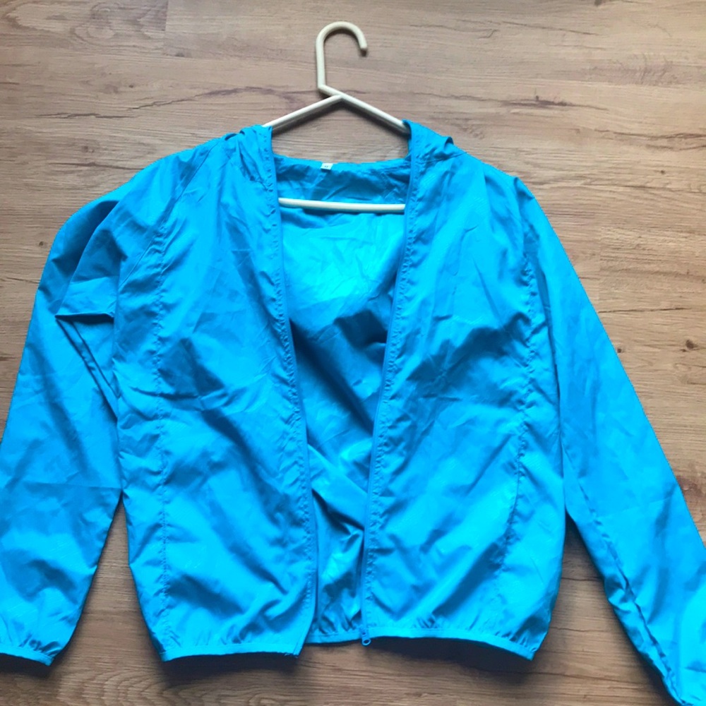 Like new Turquoise blue wind breaker zip up size M